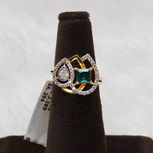"A Touch of Nature: Gold Ring with Rich Green Gemstone"