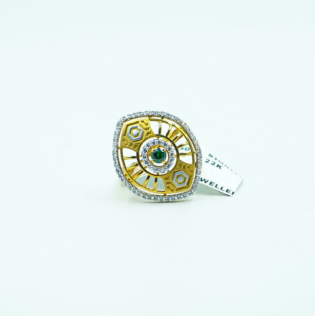 "An elegant and one-of-a-kind gold ring featuring a captivating green gemstone at its center.