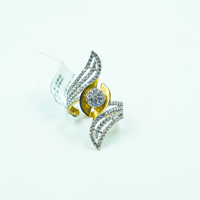 "A simple yet luxurious gold ring, featuring brilliant diamonds that capture light and attention effortlessly."